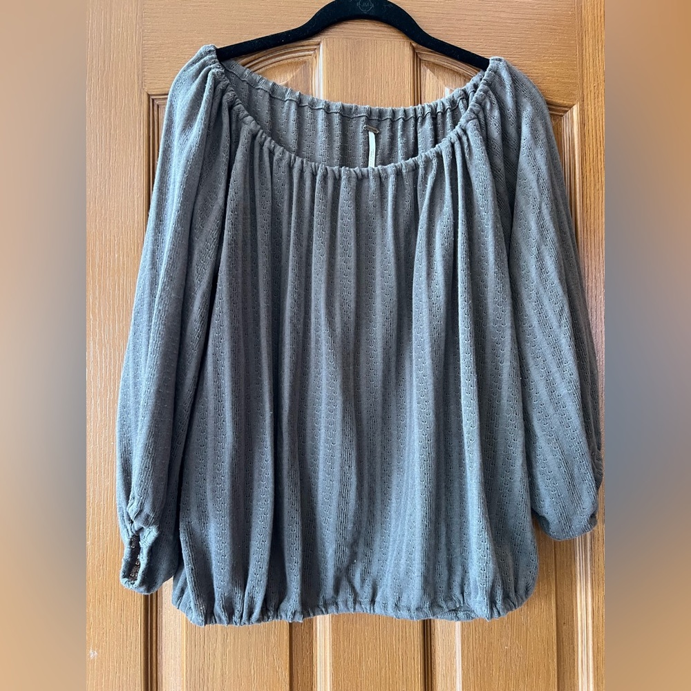 Free People sweater-like blouse. Can be worn off the shoulders or normally